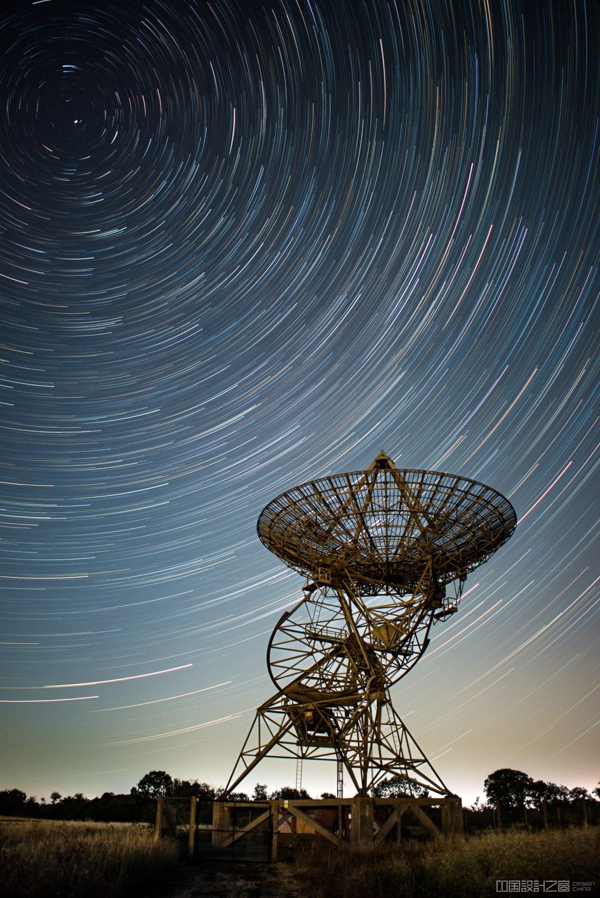 Star trails taken over a deactivated radio telescope antenna