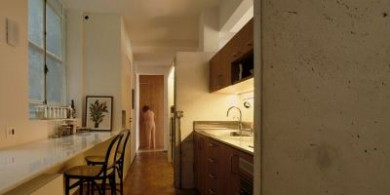 混凝土箱體界定：廚房與客廳界限設(shè)計(jì)